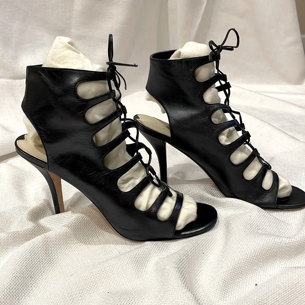 Via Spiga black leather lace-up stilettos.